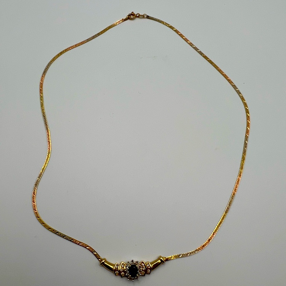 Saphire/diamond with tricolor 14K gold chain.